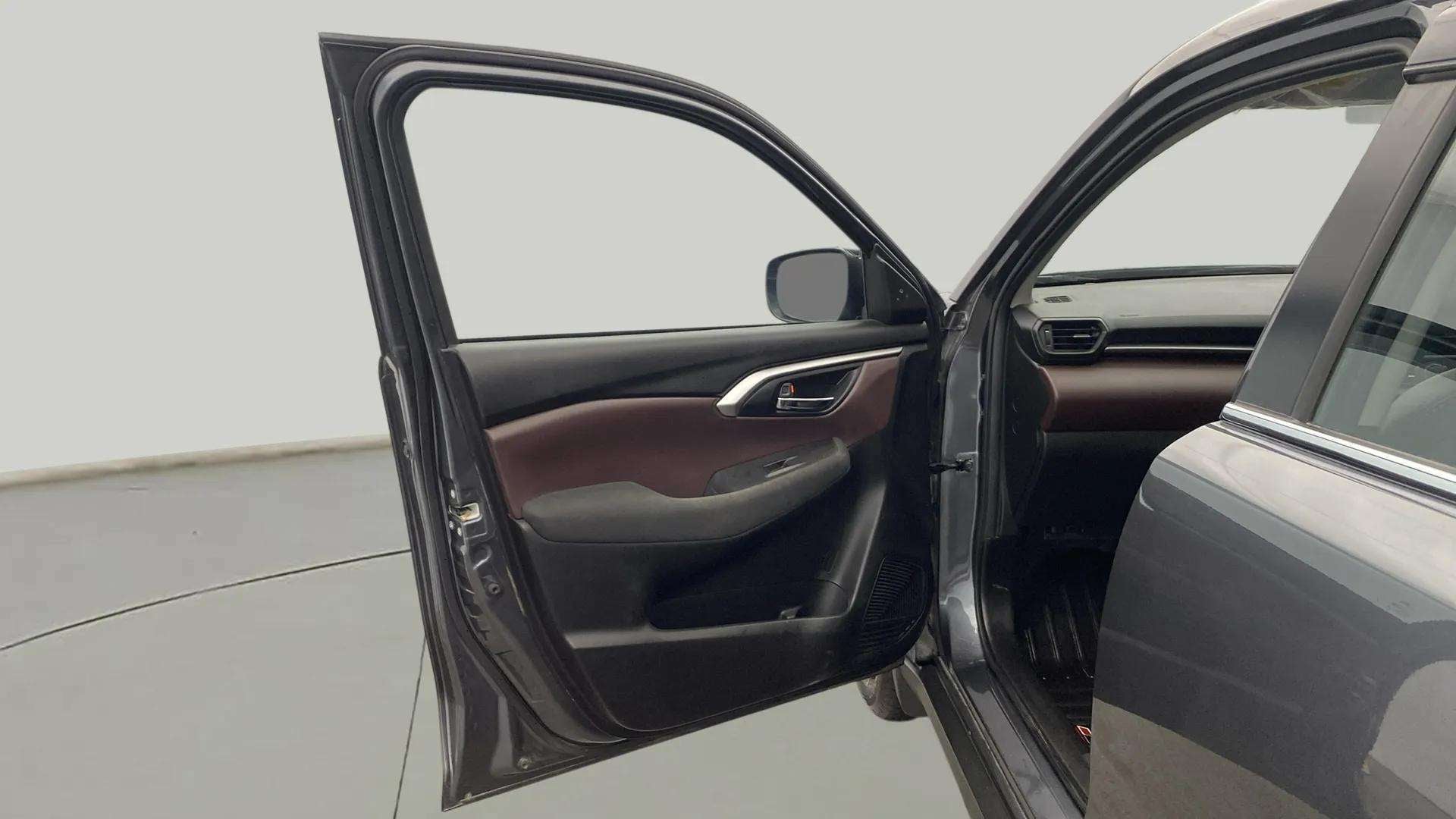 Front door and dashboard view of a Maruti Suzuki Grand Vitara