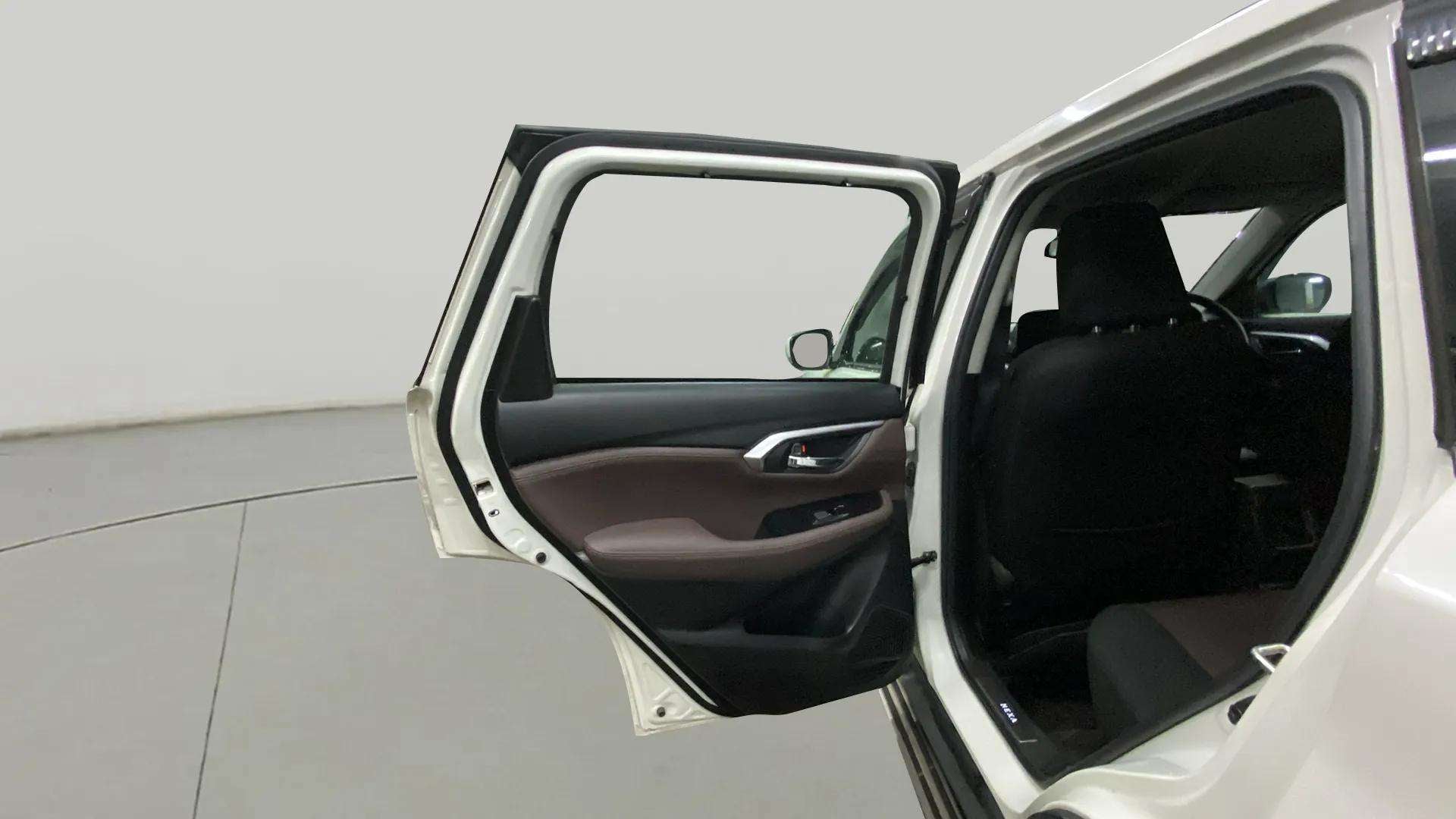 Rear door and interior view of a Maruti Suzuki Grand Vitara