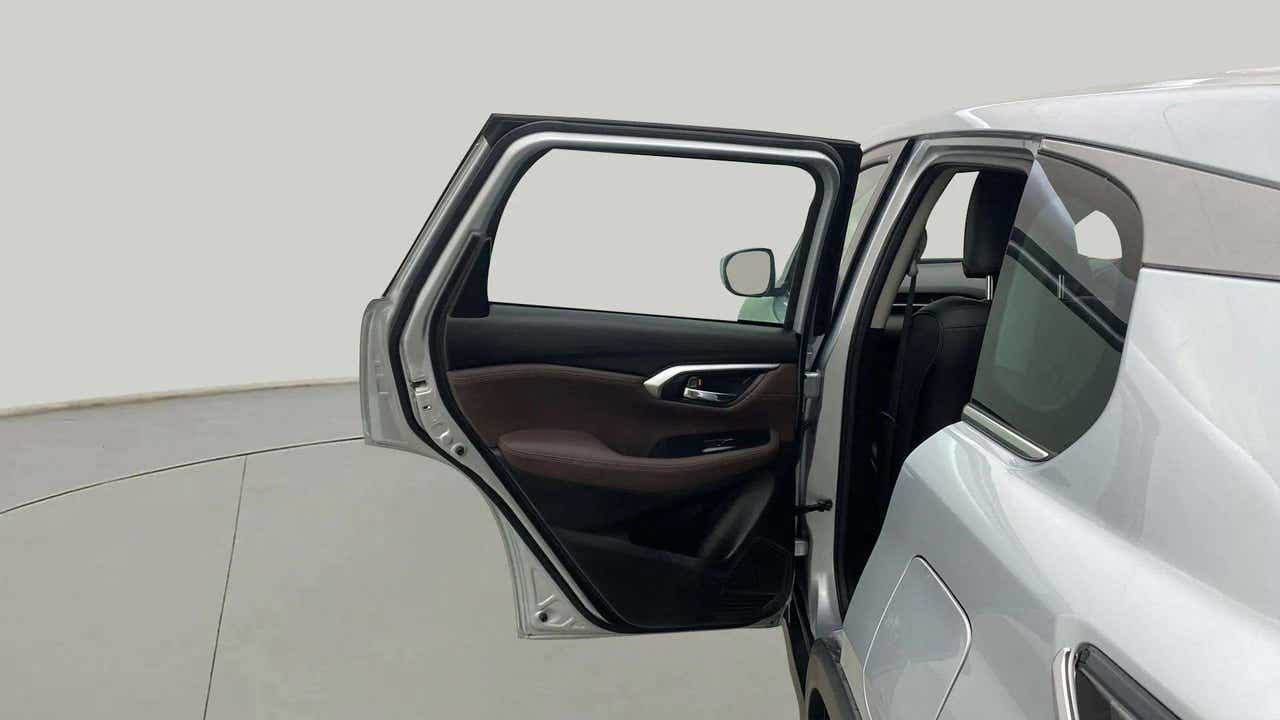 Left rear door open view of a Maruti Suzuki Grand Vitara