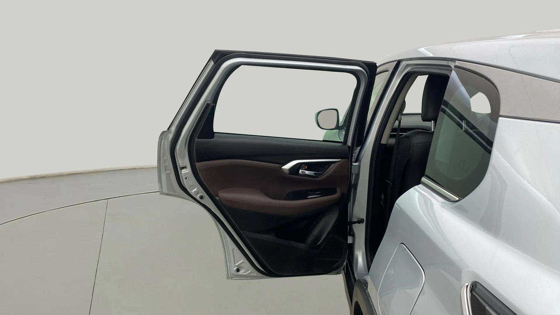 Left rear door open view of a Maruti Suzuki Grand Vitara