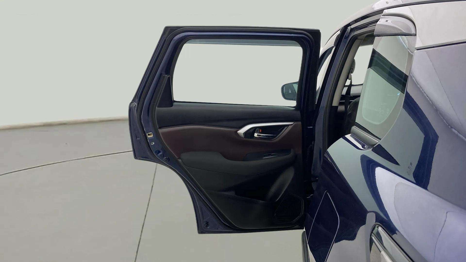 Rear door open view of a Maruti Suzuki Grand Vitara