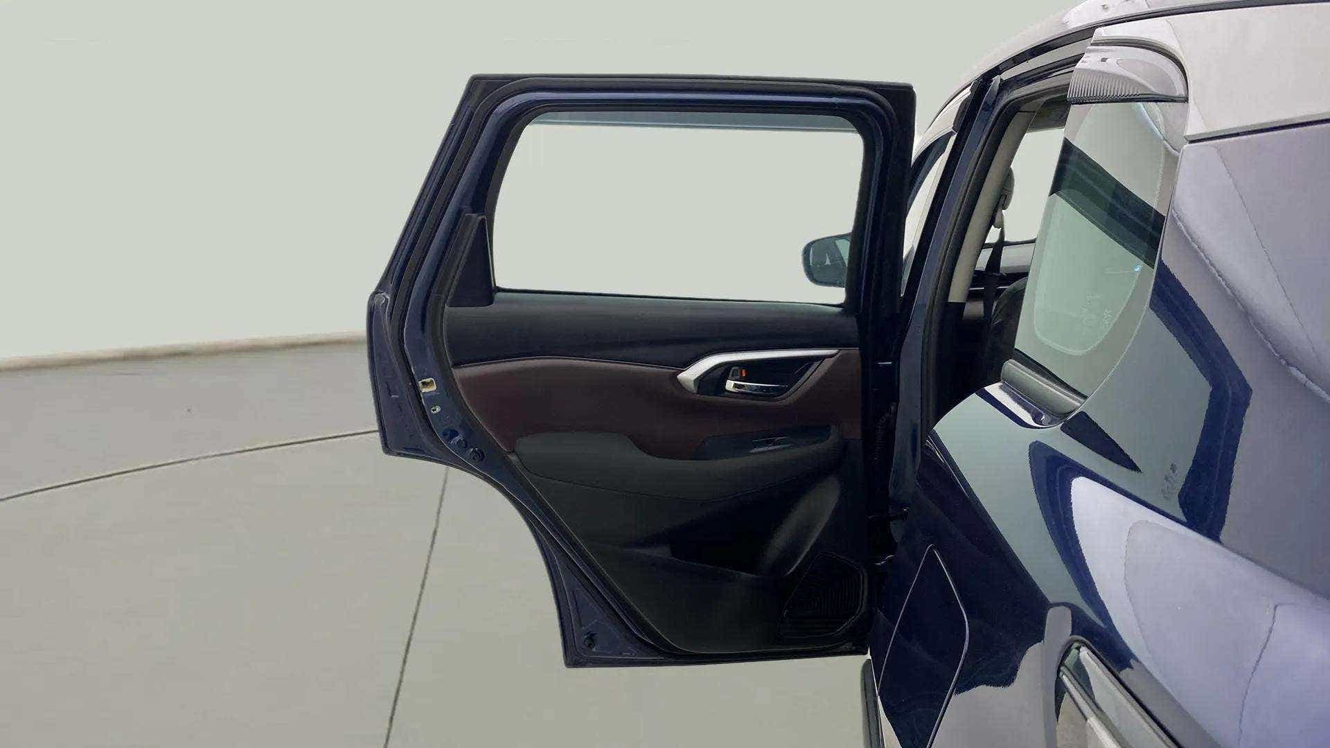 Rear door open view of a Maruti Suzuki Grand Vitara