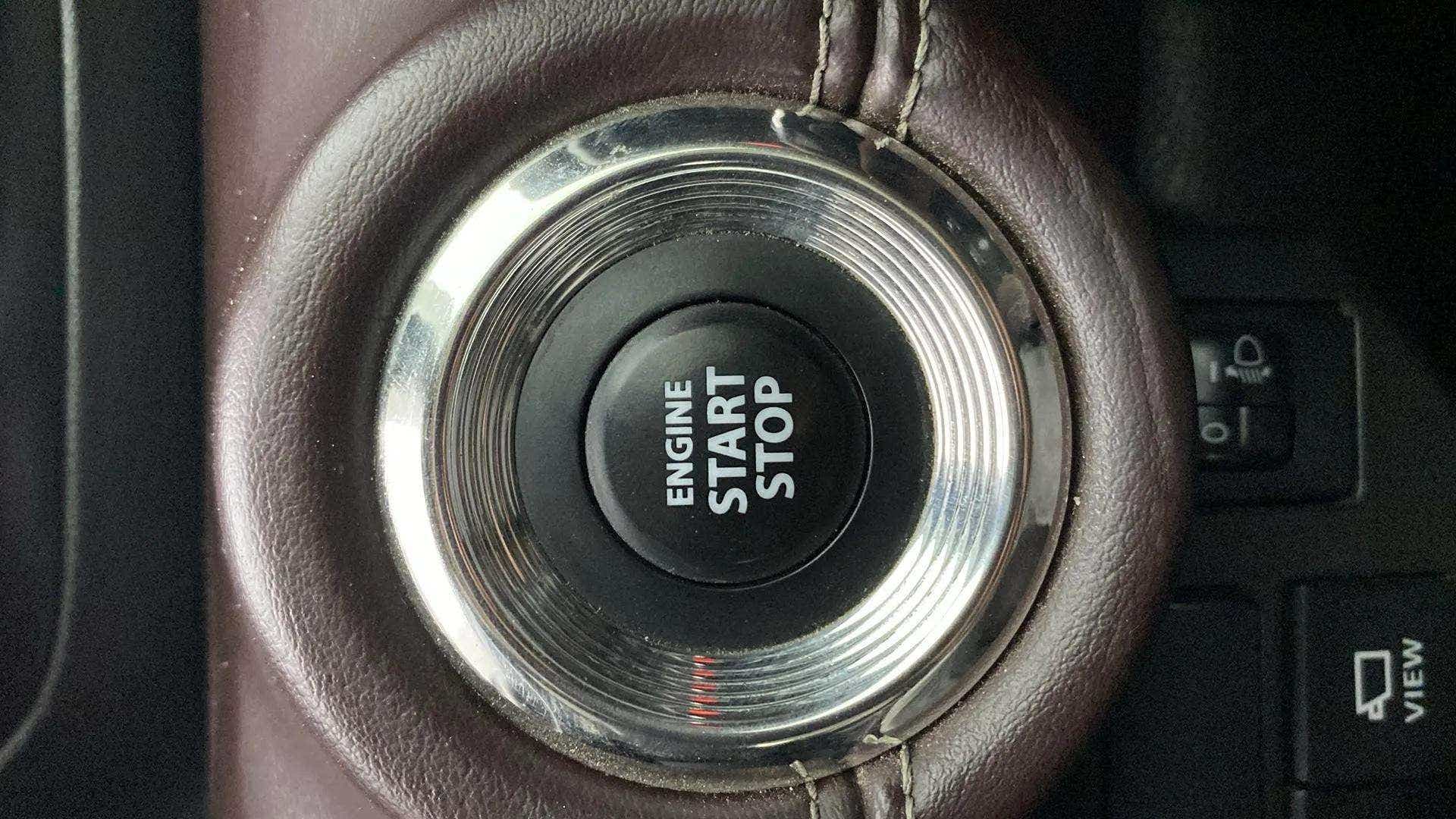 Engine start stop button of a Maruti Suzuki Grand Vitara