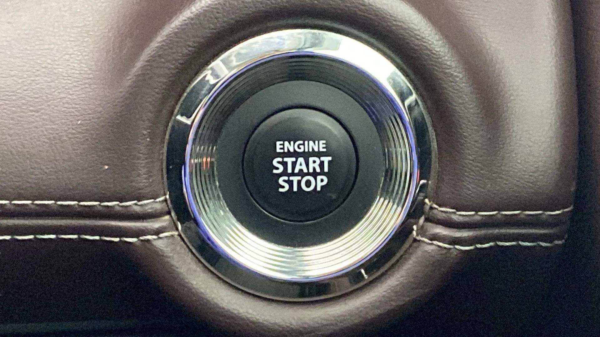 Engine start stop button of a Maruti Suzuki Grand Vitara
