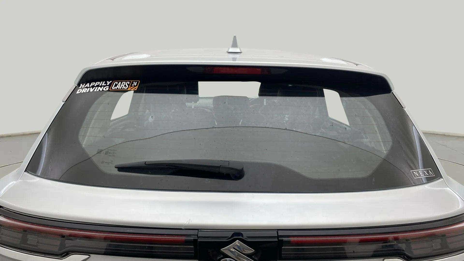 Rear view of a splendid silver Maruti Suzuki Grand Vitara