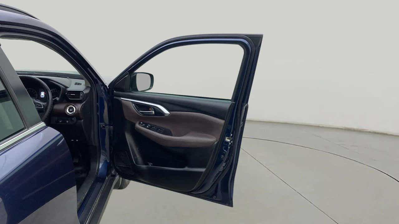 Driver side door and dashboard of a Maruti Suzuki Grand Vitara