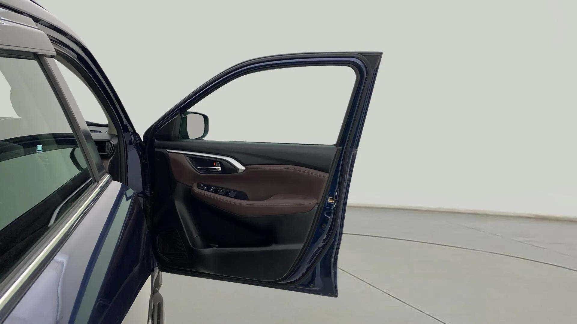 Driver side door interior of a Maruti Suzuki Grand Vitara