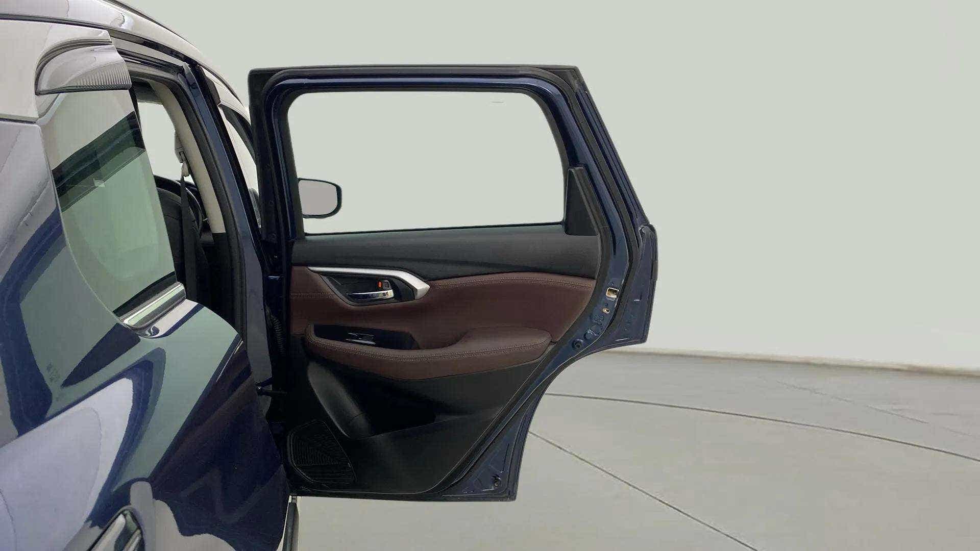 Open rear door view of a Maruti Suzuki Grand Vitara