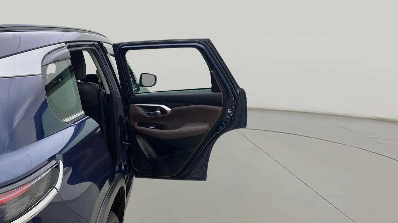 Rear side view with open door of a Maruti Suzuki Grand Vitara