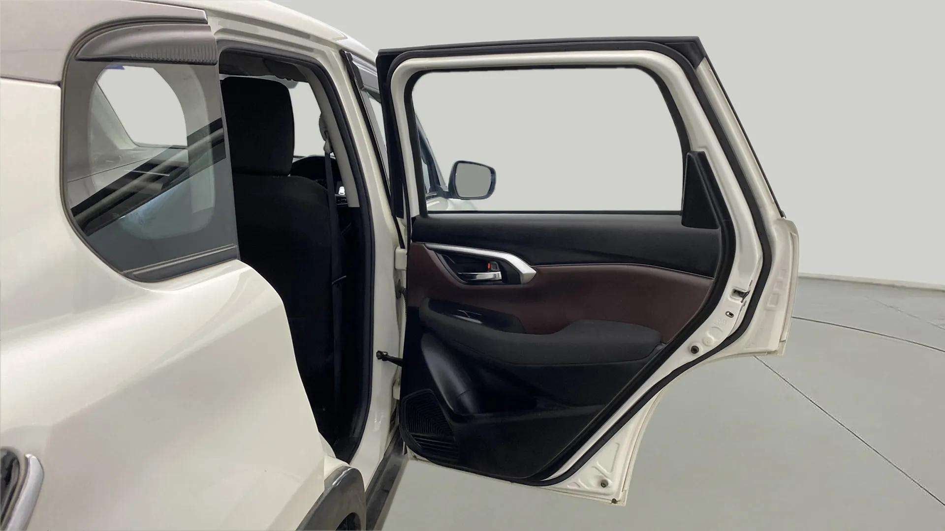 Rear passenger door open view of a Maruti Suzuki Grand Vitara