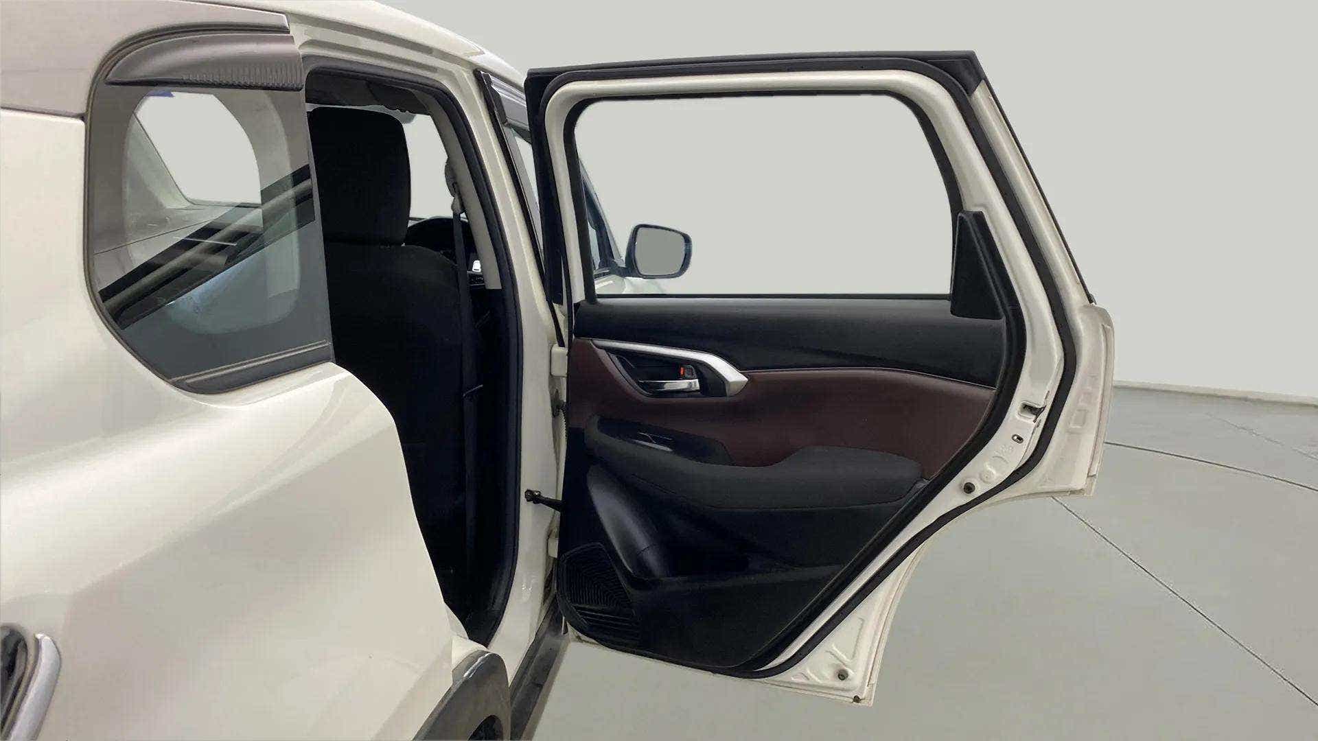 Rear passenger door open view of a Maruti Suzuki Grand Vitara