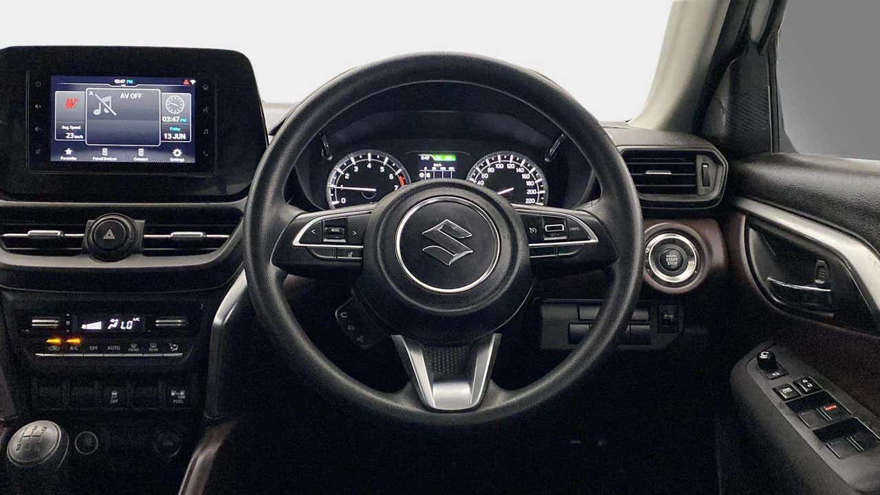 Interior dashboard view of a Maruti Suzuki Grand Vitara