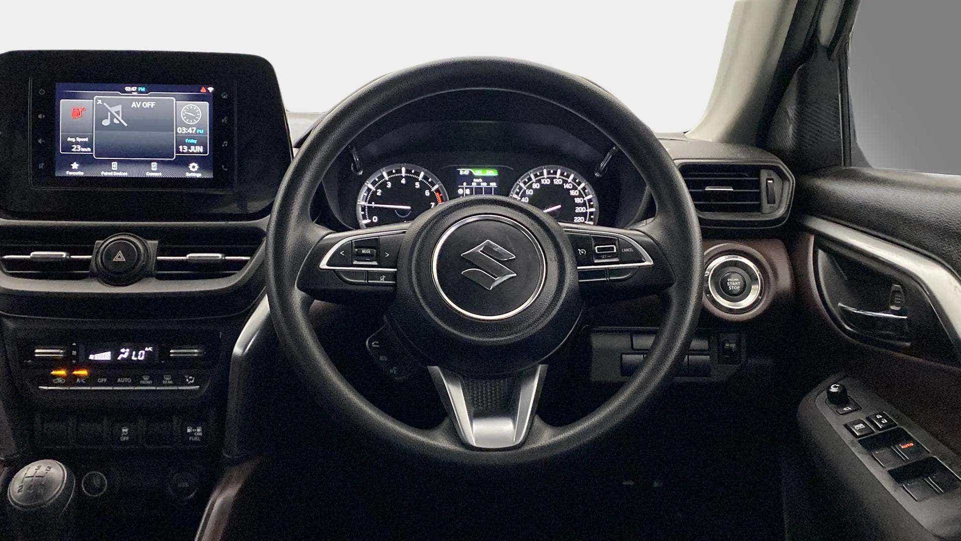 Interior dashboard view of a Maruti Suzuki Grand Vitara