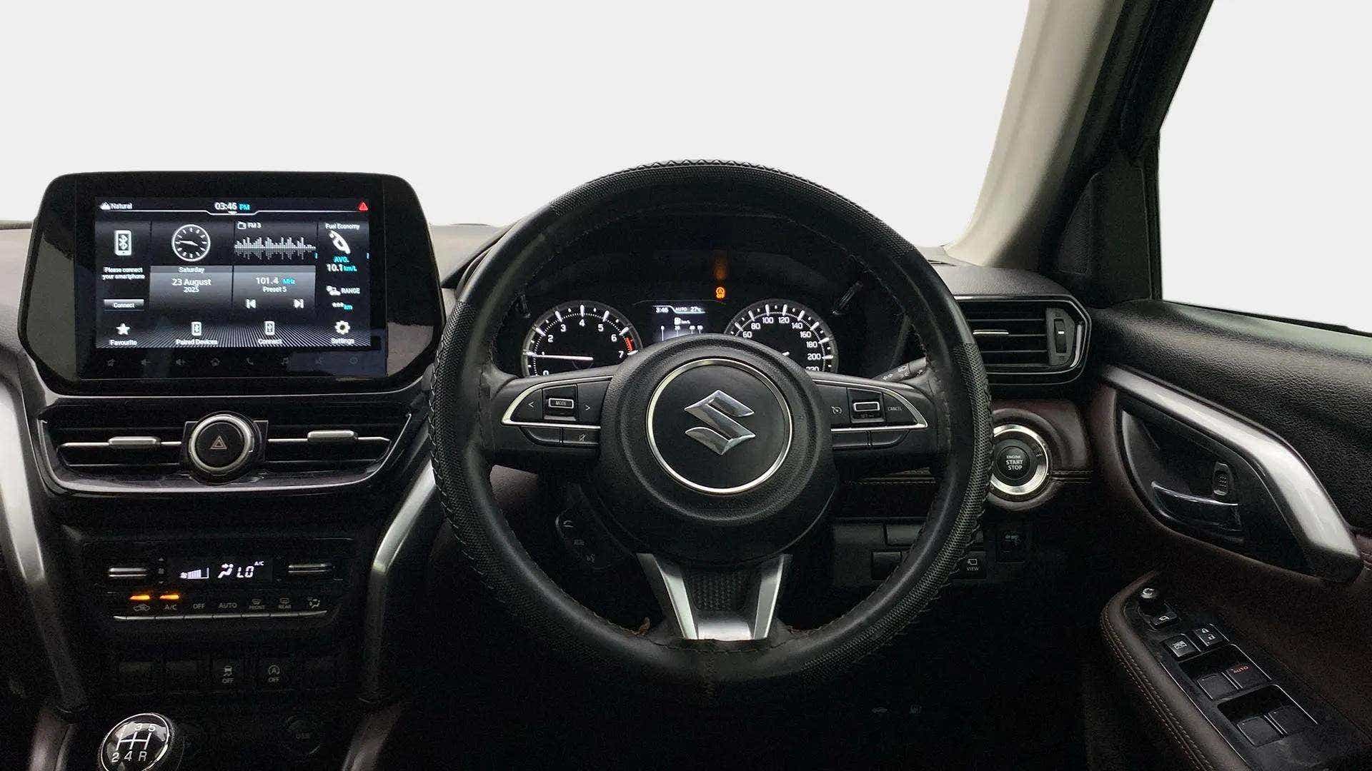 Dashboard and steering wheel of a Maruti Suzuki Grand Vitara
