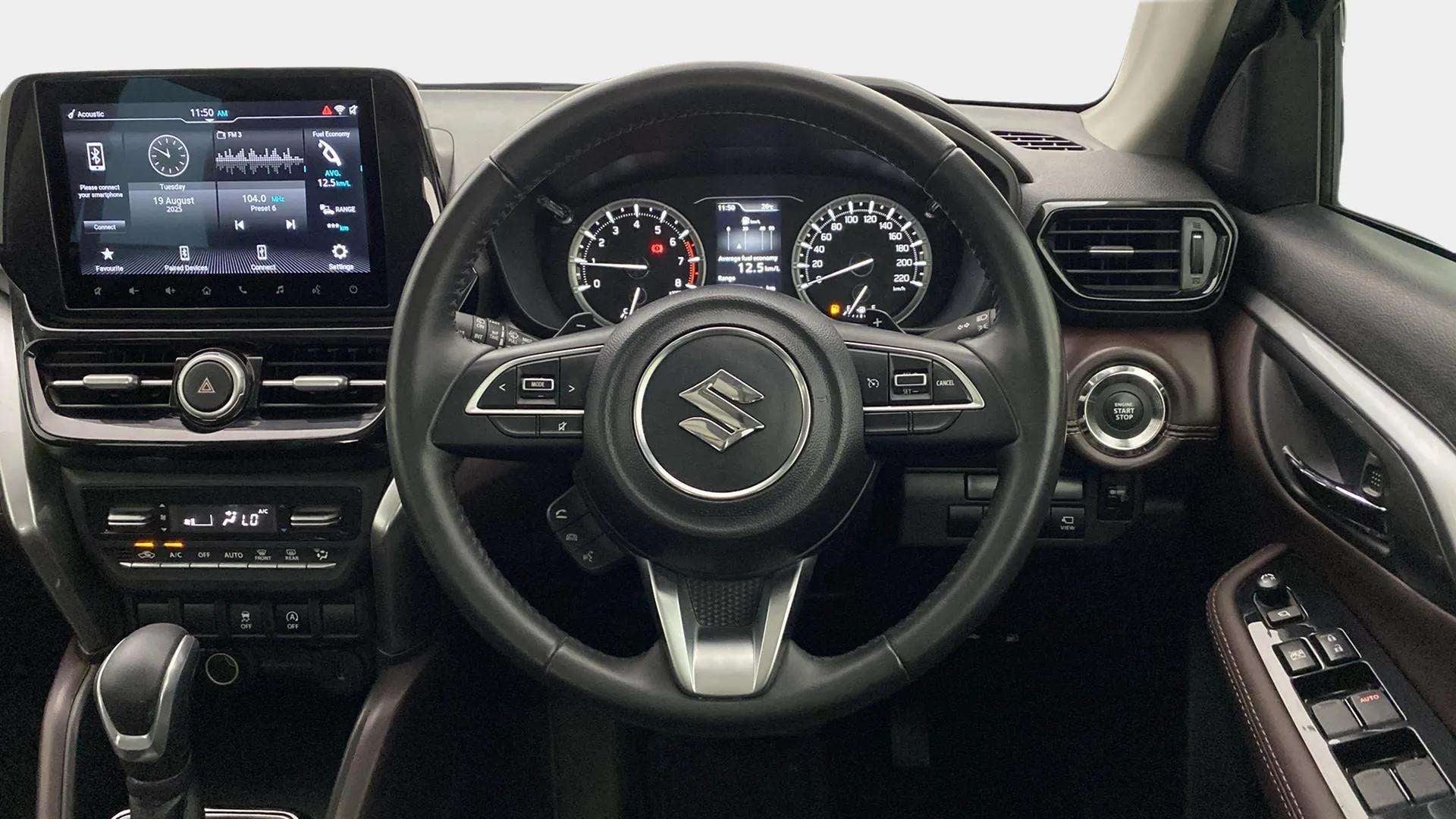 Dashboard and steering wheel of a Maruti Suzuki Grand Vitara