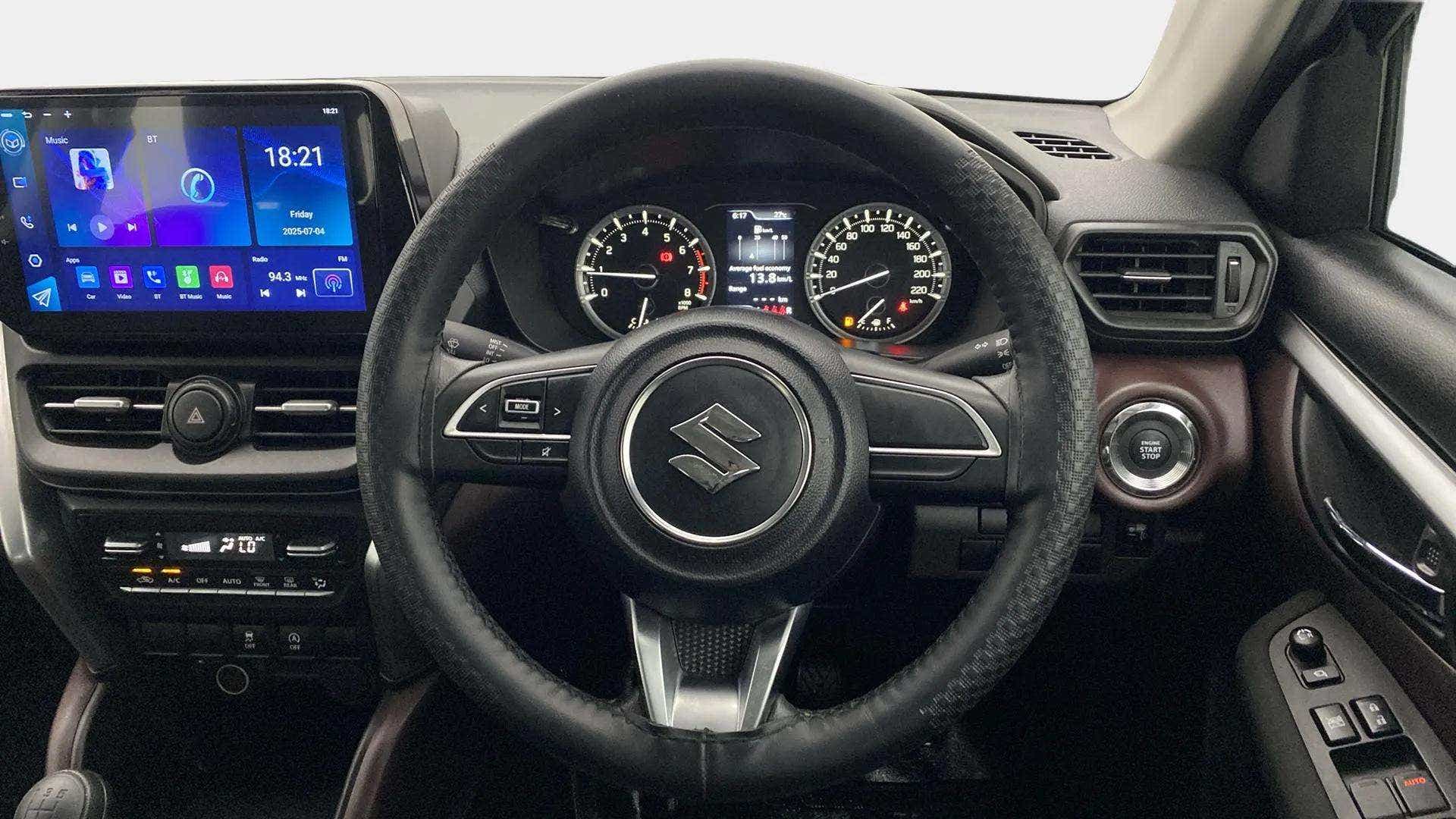 Interior dashboard view of a Maruti Suzuki Grand Vitara