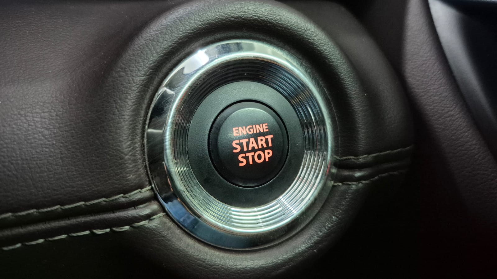 Engine start stop button of a Maruti Suzuki Grand Vitara