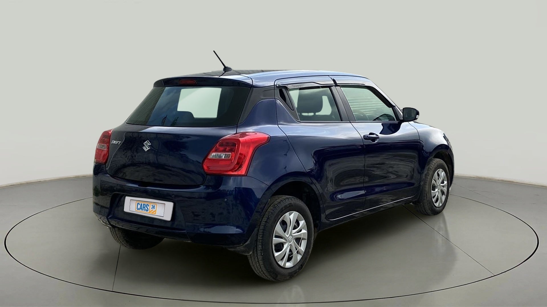 Rear three-quarter of a Maruti Suzuki Swift 2021 - 2023