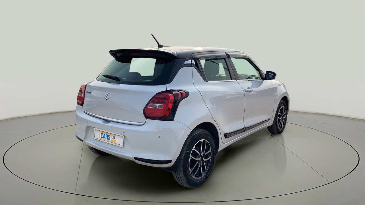 Rear three-quarter view of a maruti suzuki swift 2021 - 2023