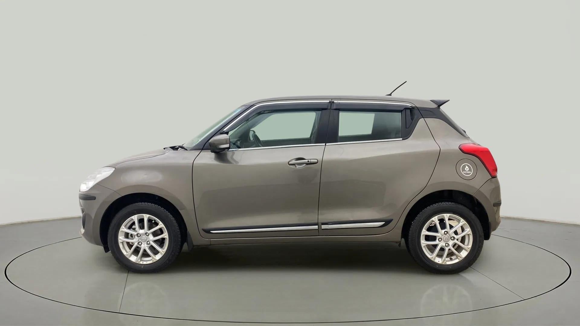 Side view of a Maruti Suzuki Swift 2021 - 2023