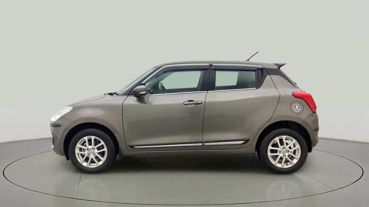 Side view of a Maruti Suzuki Swift 2021 - 2023