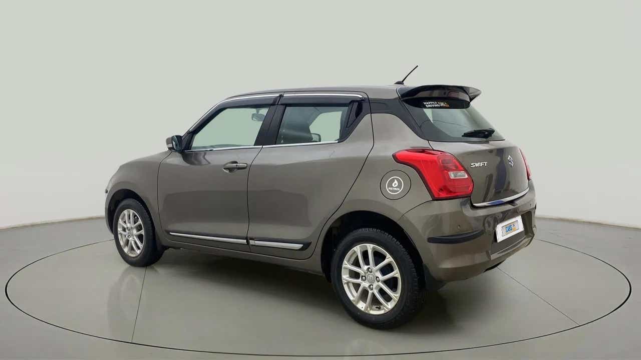 Rear three-quarter view of a Maruti Suzuki Swift 2021 - 2023