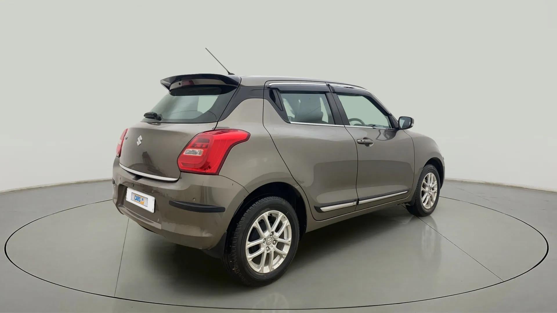 Rear three-quarter view of a Maruti Suzuki Swift 2021 - 2023