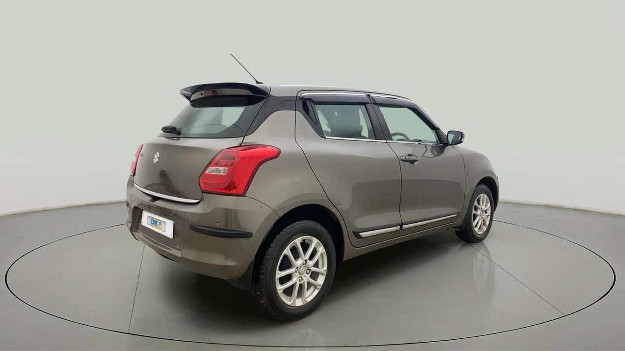 Rear three-quarter view of a Maruti Suzuki Swift 2021 - 2023