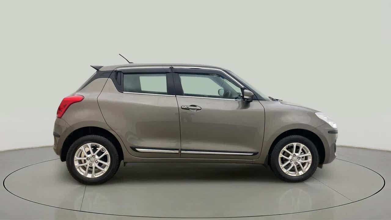 Side view of a Maruti Suzuki Swift 2021 - 2023