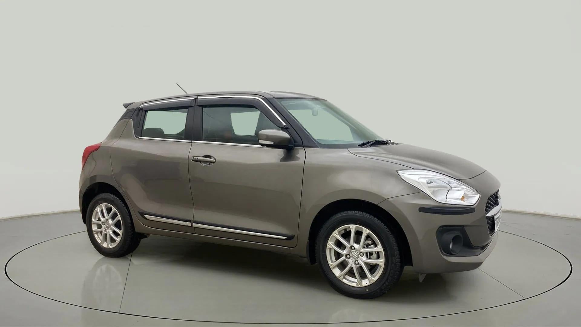 Side view of a Maruti Suzuki Swift 2021 - 2023