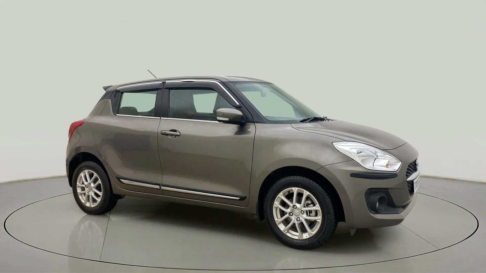 Side view of a Maruti Suzuki Swift 2021 - 2023