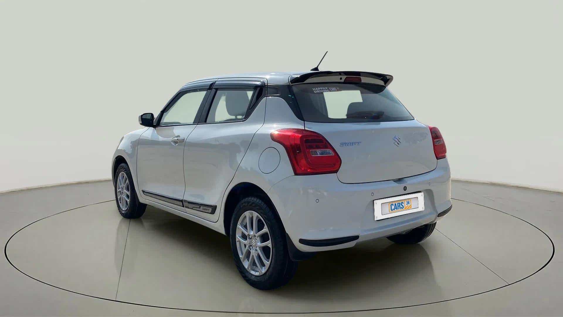 Rear three-quarter of a Maruti Suzuki Swift