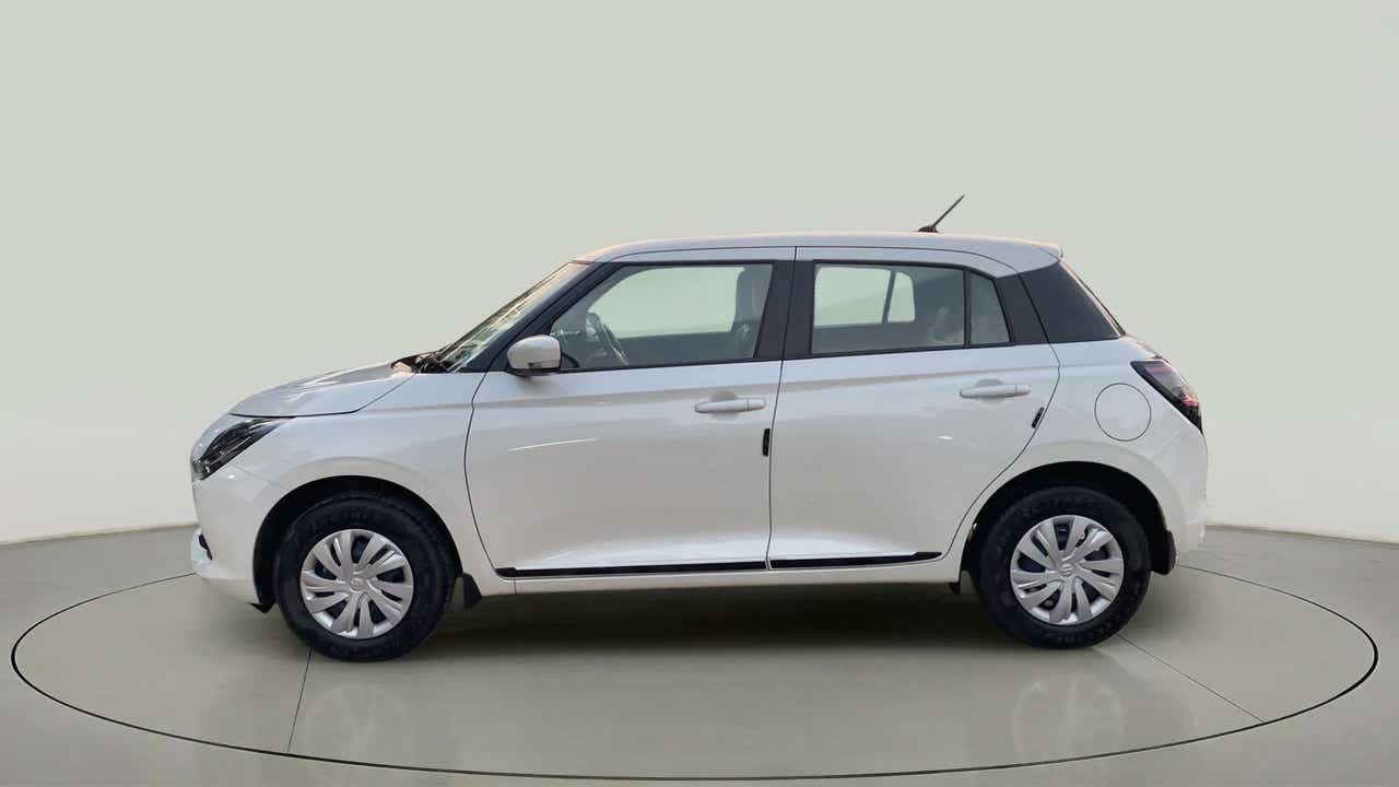 Side view of a Pearl Arctic White with Pearl Midnight Black Maruti Suzuki Swift