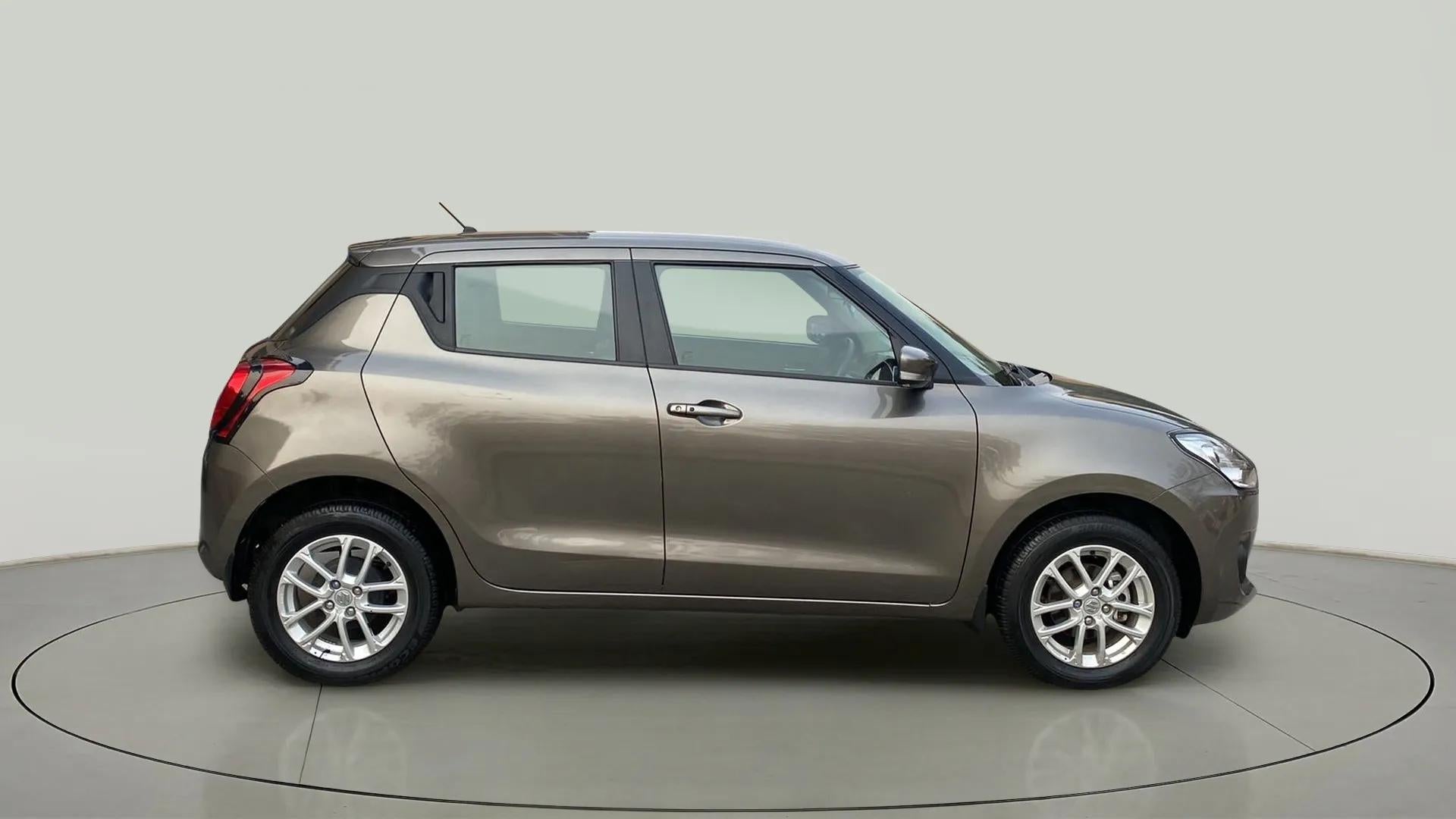 Side view of a Maruti Suzuki Swift 2021 - 2023