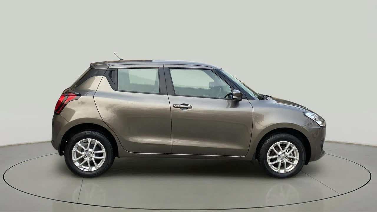 Side view of a Maruti Suzuki Swift 2021 - 2023