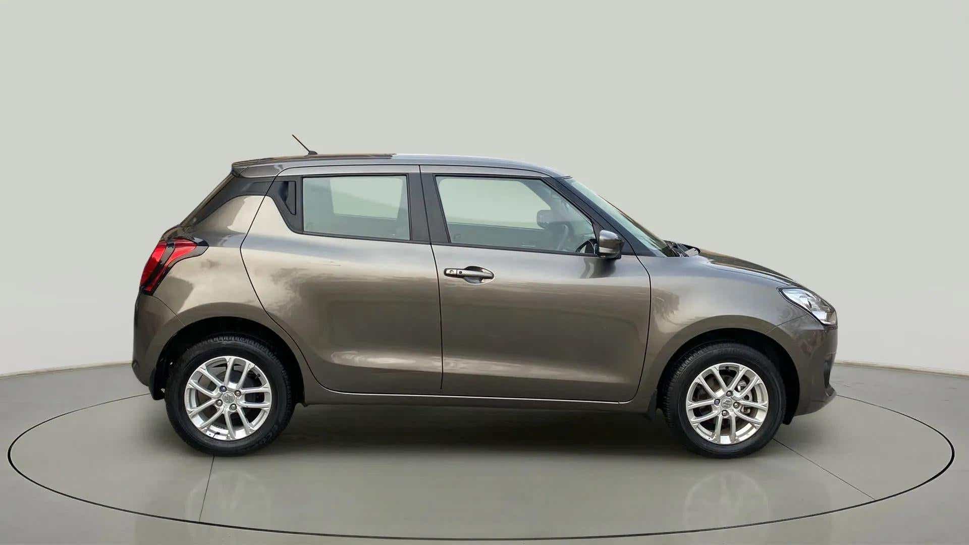 Side view of a Maruti Suzuki Swift 2021 - 2023