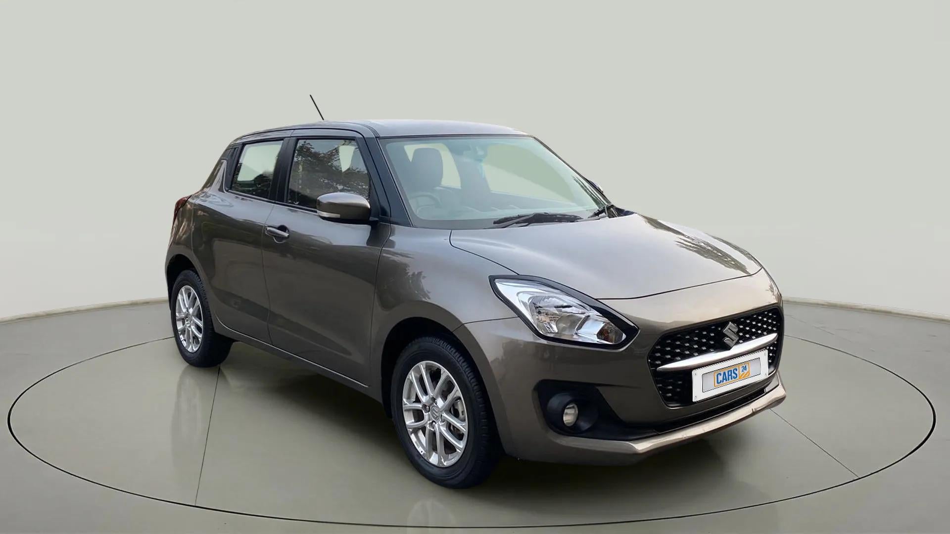 Front three-quarter view of a Maruti Suzuki Swift 2021 - 2023
