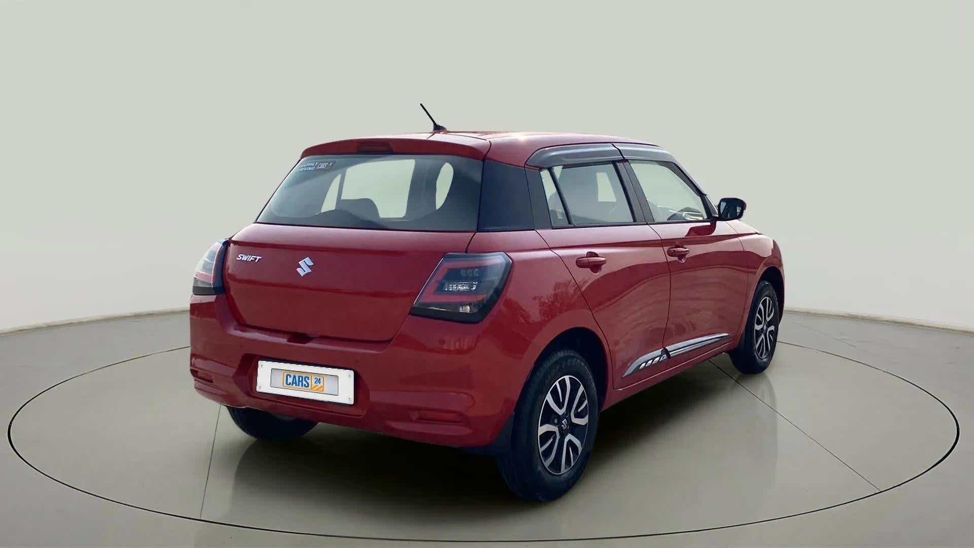 Rear three-quarter of a Maruti Suzuki Swift