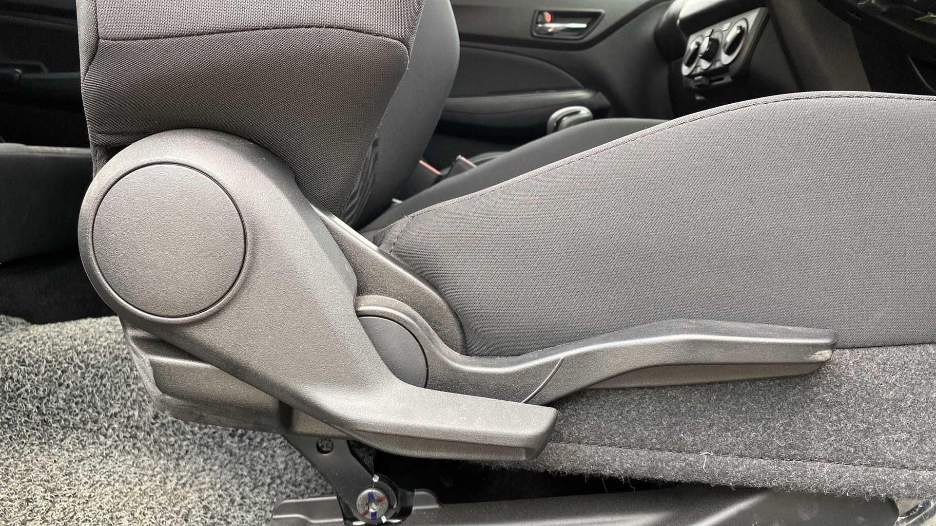 Seat adjustment lever of a Maruti Suzuki Swift 2021 - 2023