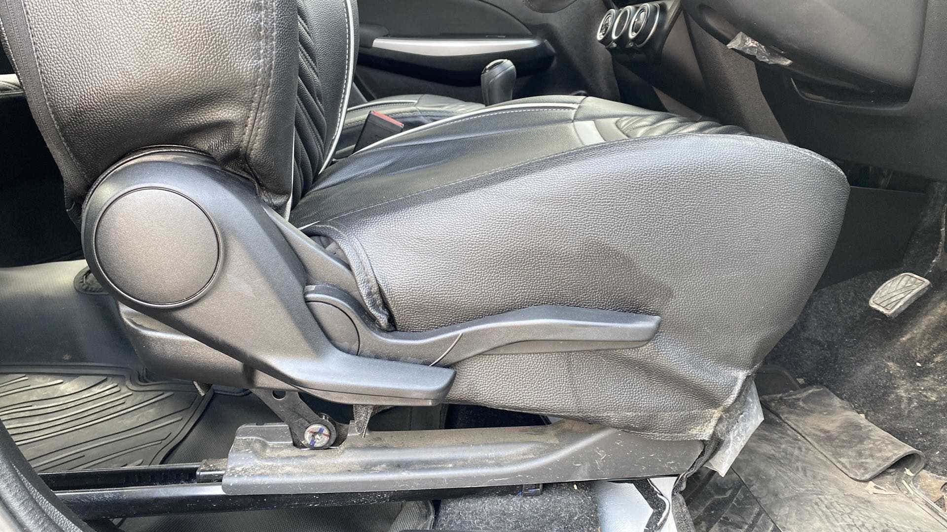 Front seat adjustment lever view of a Maruti Suzuki Swift 2021 - 2023