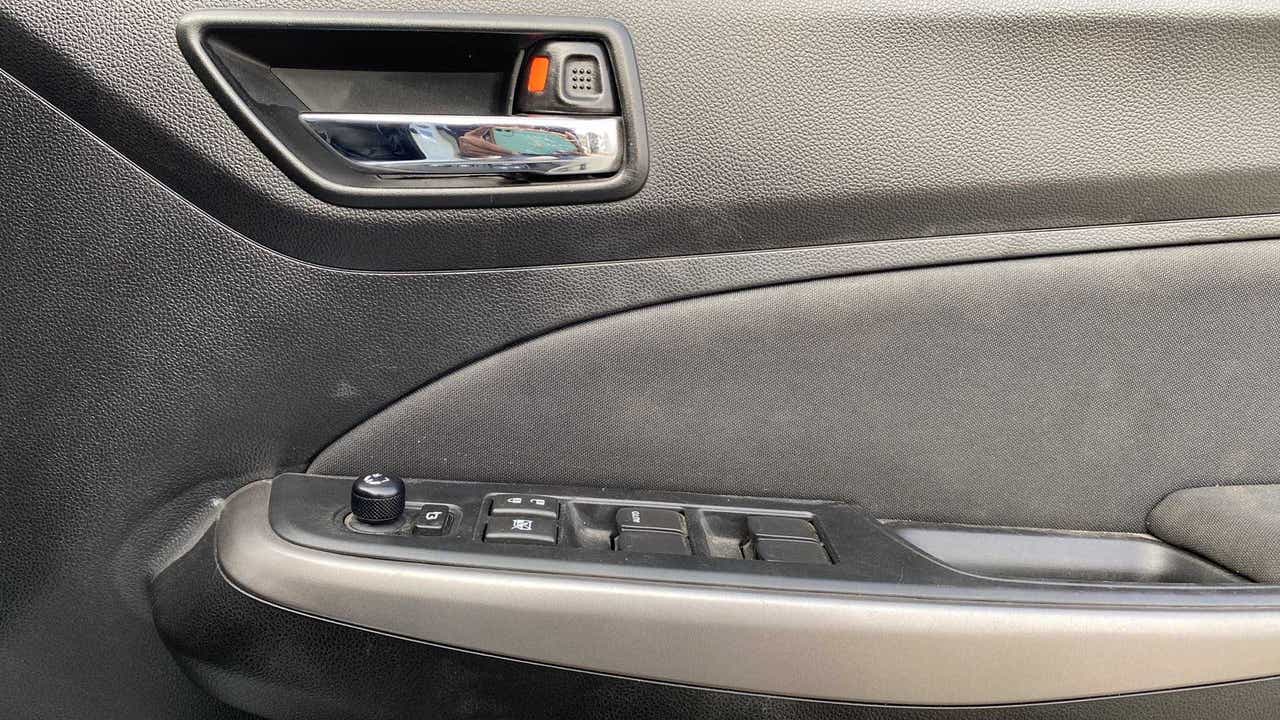 Driver side door panel of a Maruti Suzuki Swift 2021 - 2023