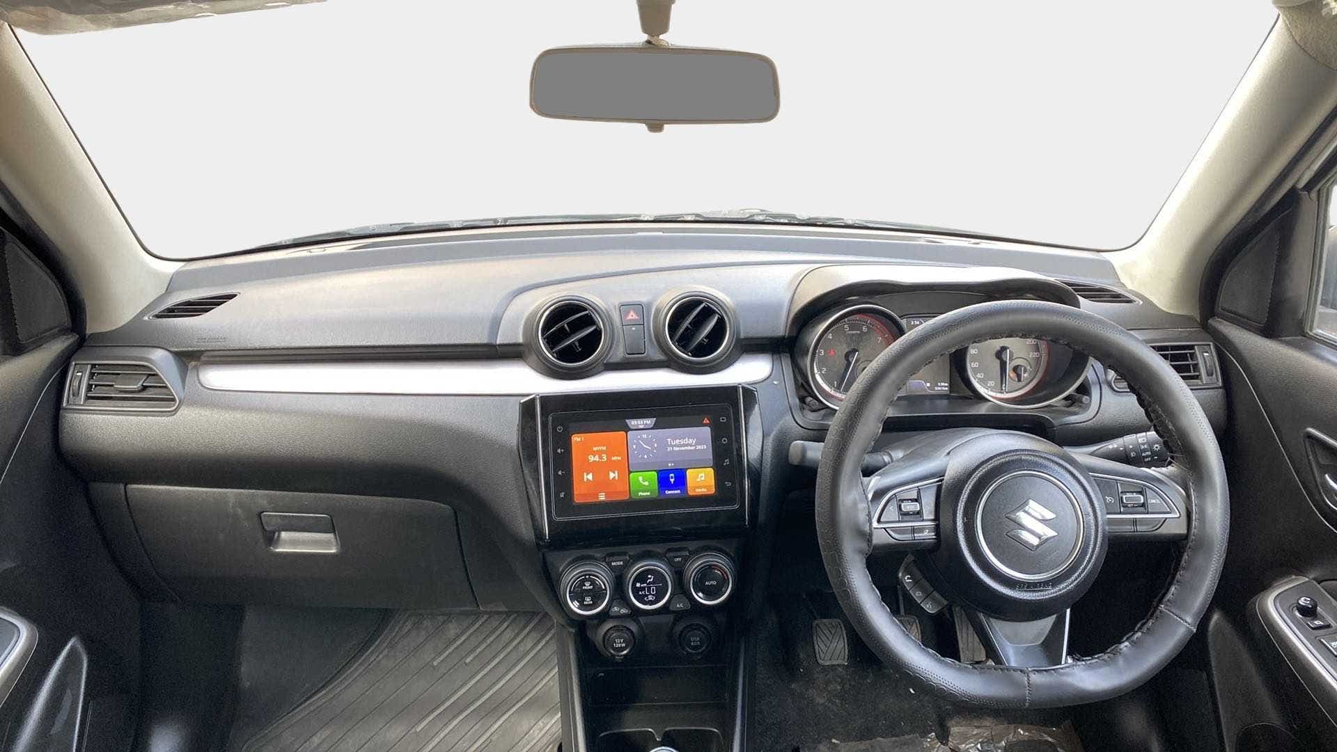 Dashboard and steering wheel of a Maruti Suzuki Swift 2021 - 2023