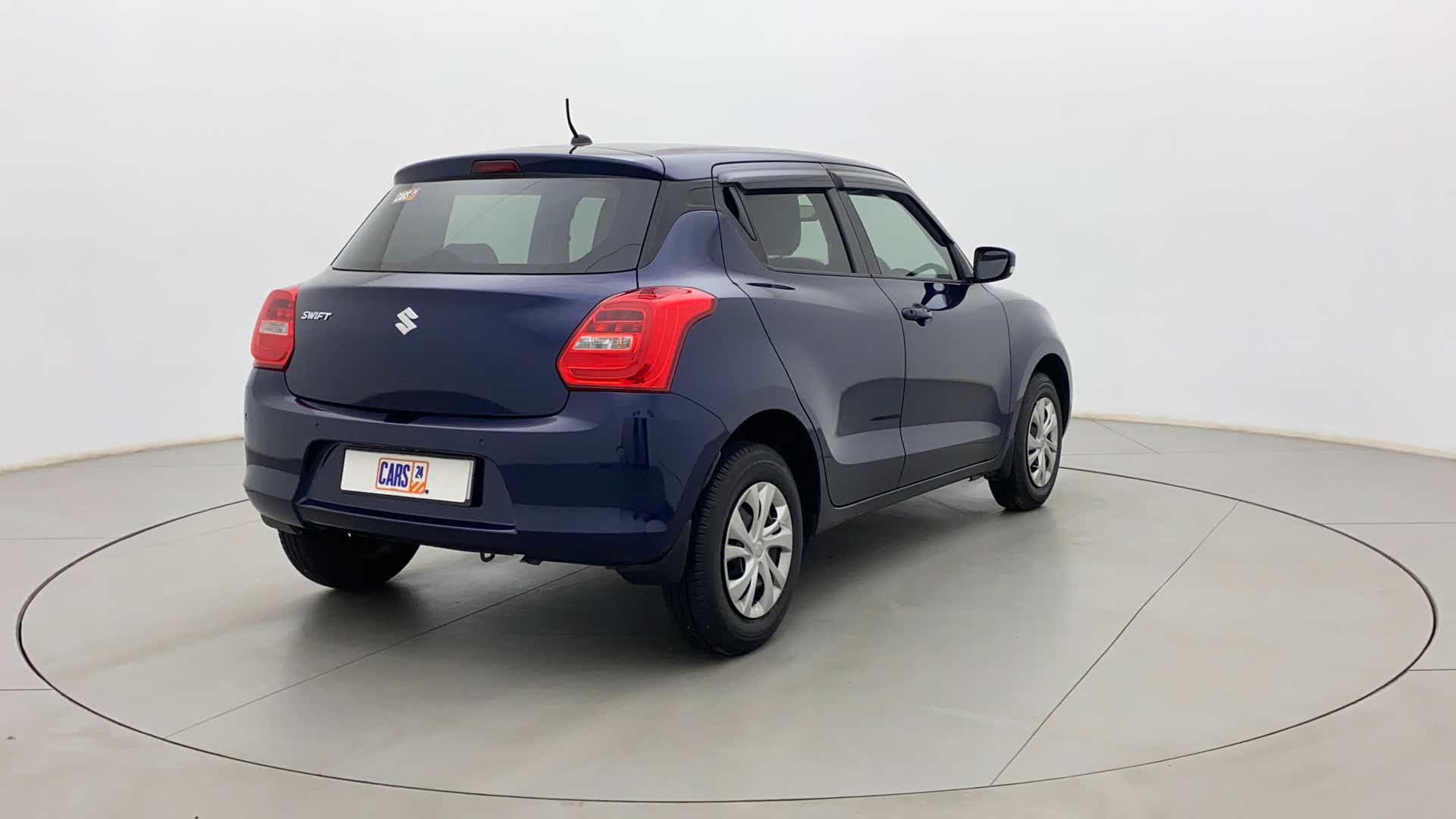 Rear three-quarter of a Maruti Suzuki Swift 2021 - 2023