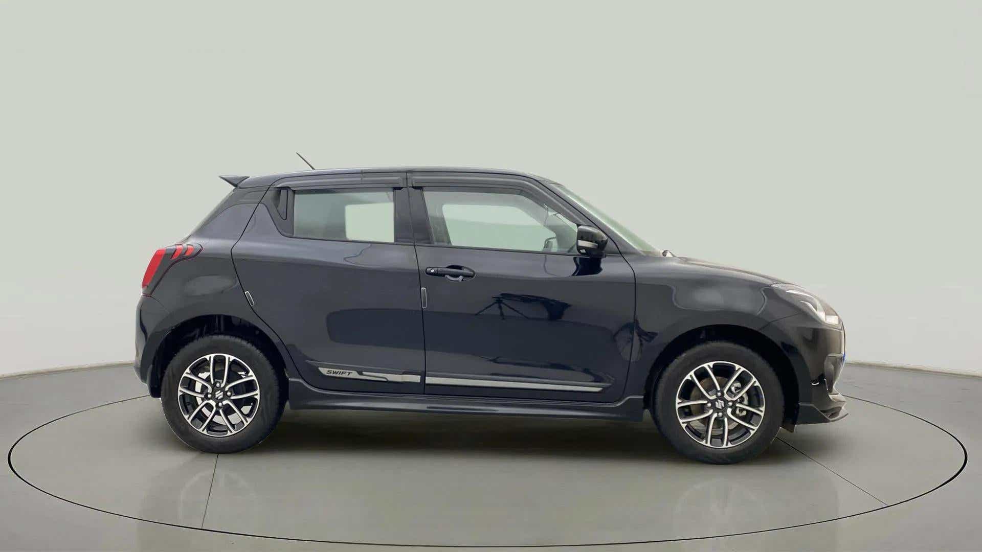 Side view of a Maruti Suzuki Swift