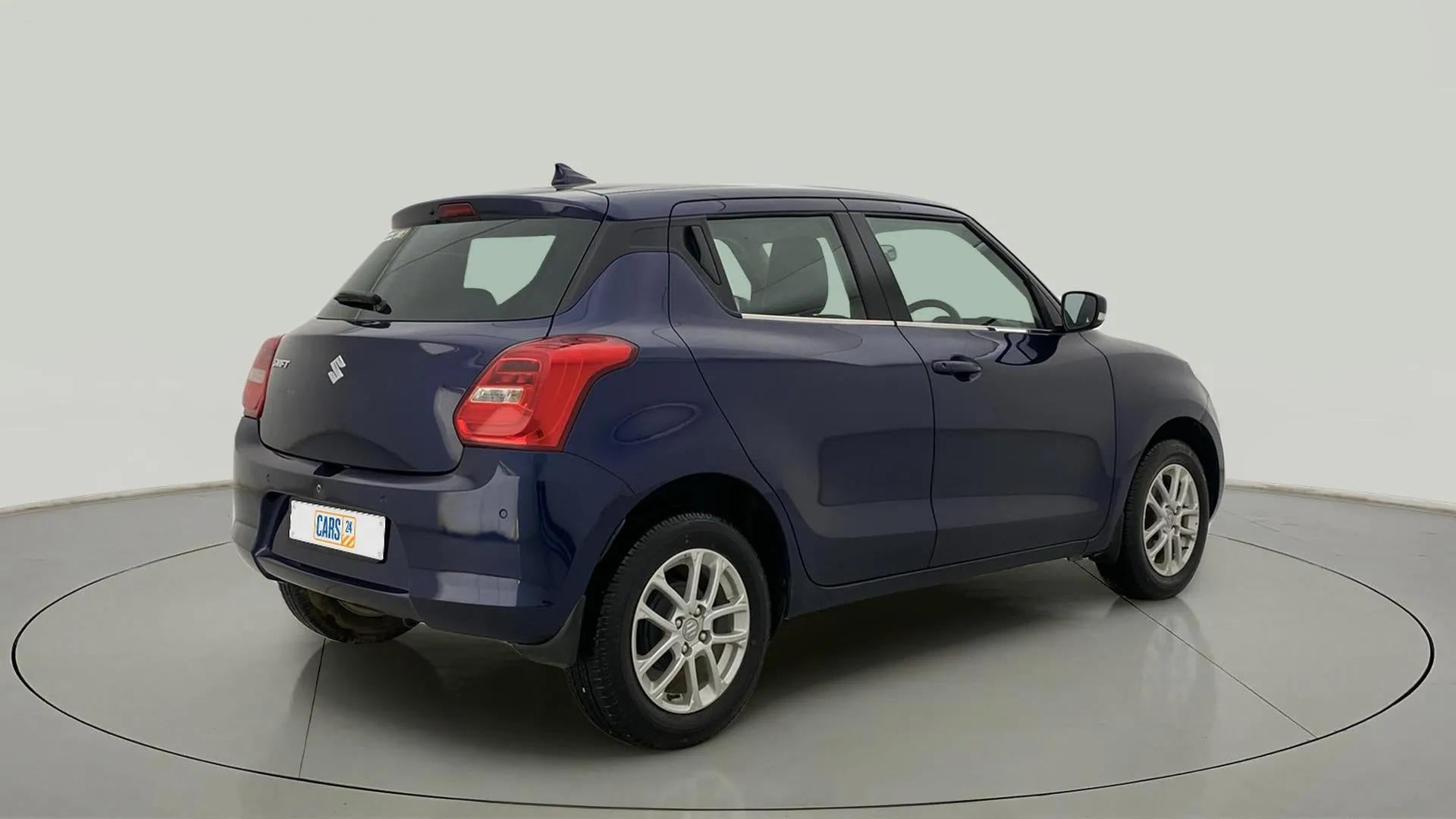 Rear three-quarter view of a maruti suzuki swift