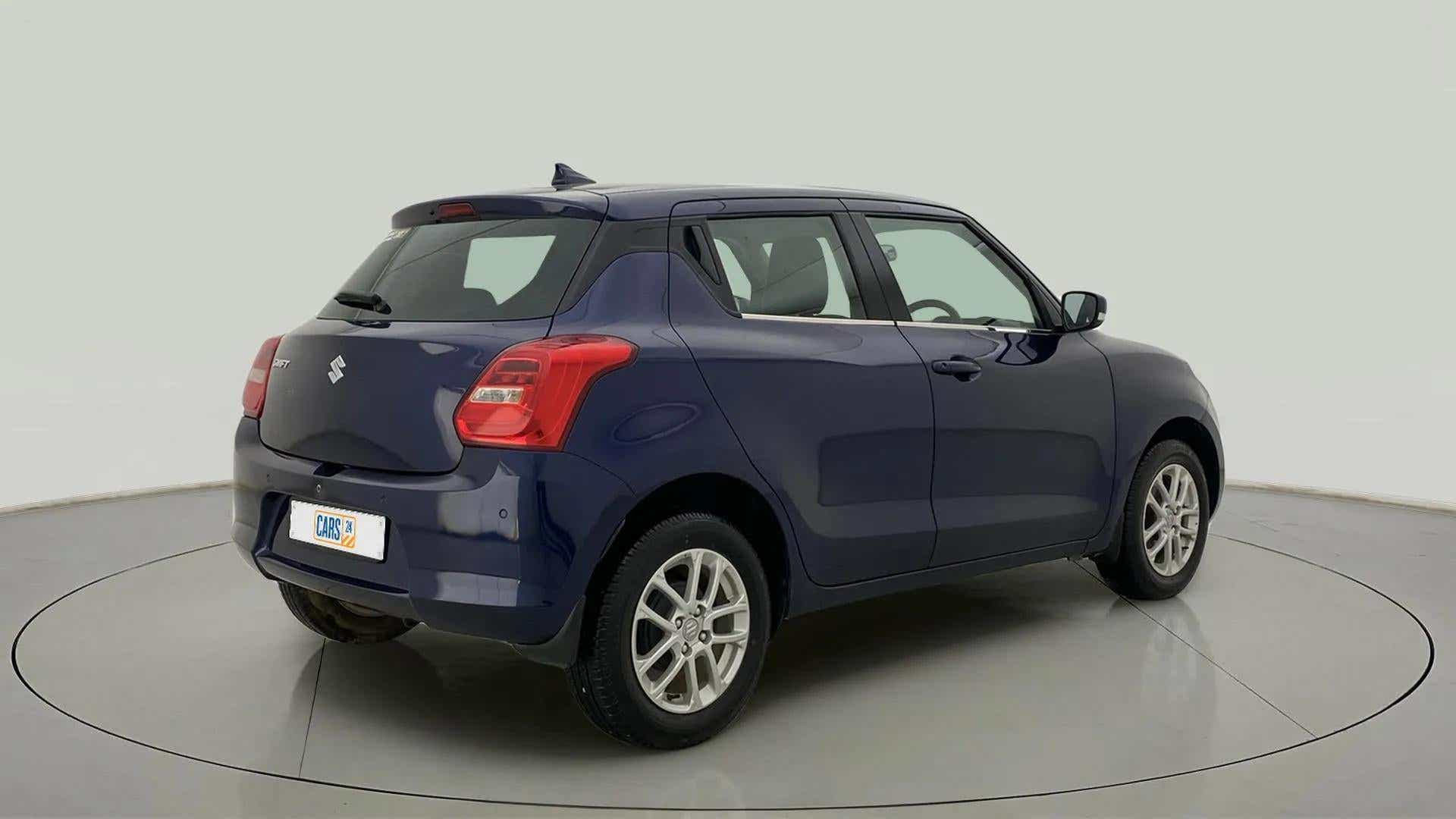 Rear three-quarter view of a maruti suzuki swift