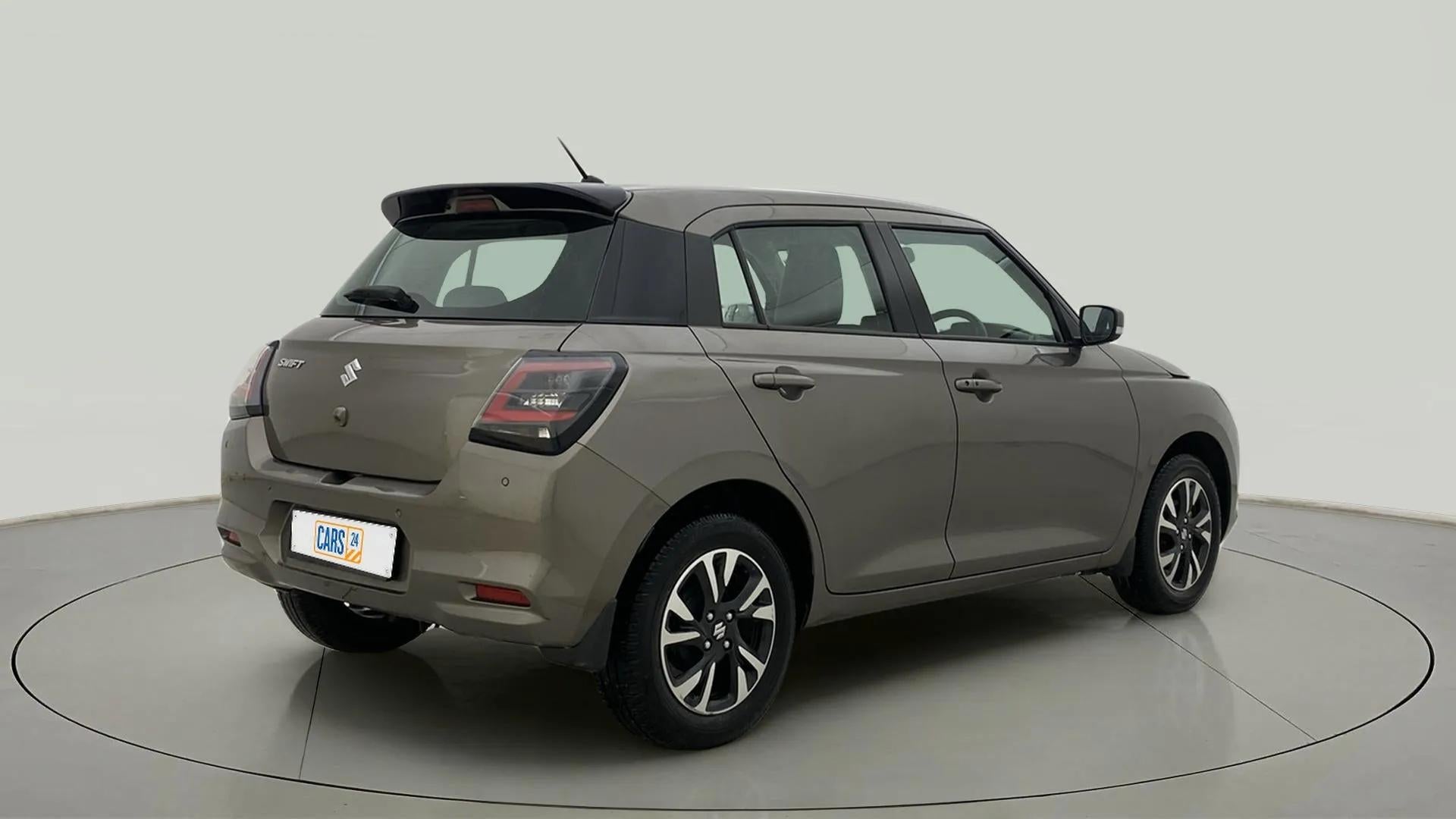 Rear three-quarter view of a Maruti Suzuki Swift