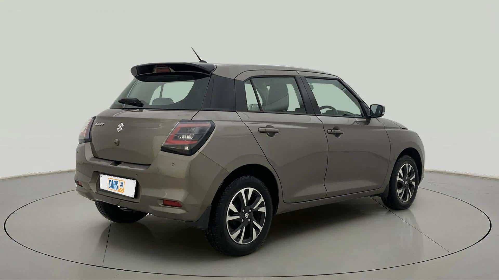 Rear three-quarter view of a Maruti Suzuki Swift