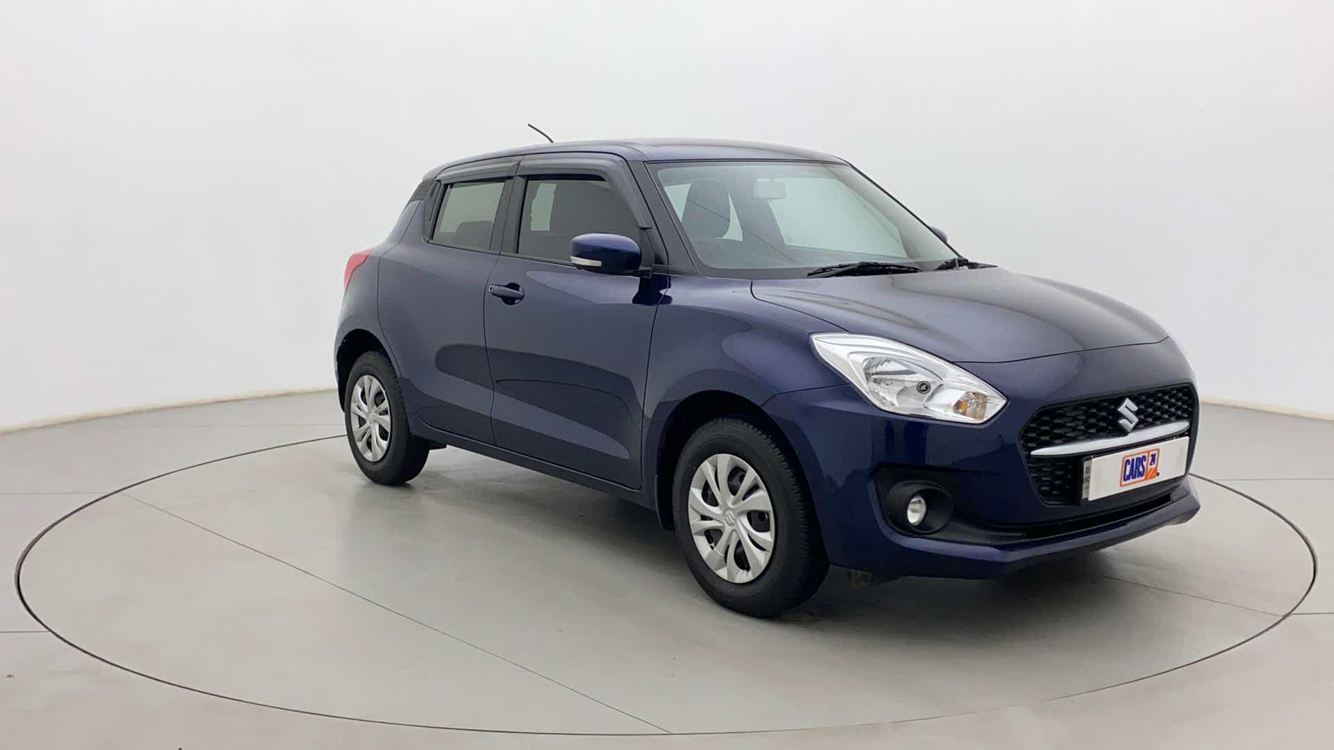 Front three-quarter view of a Maruti Suzuki Swift 2021 - 2023