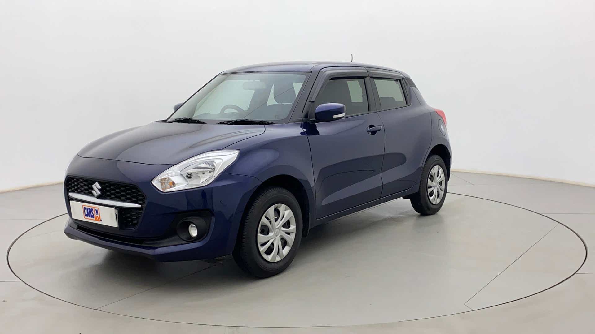 Front three-quarter view of a maruti suzuki swift 2021 - 2023